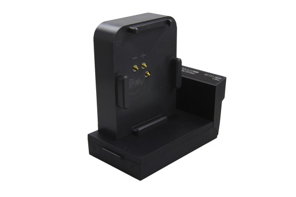 Black charging cradle for power tool batteries with contact pins.