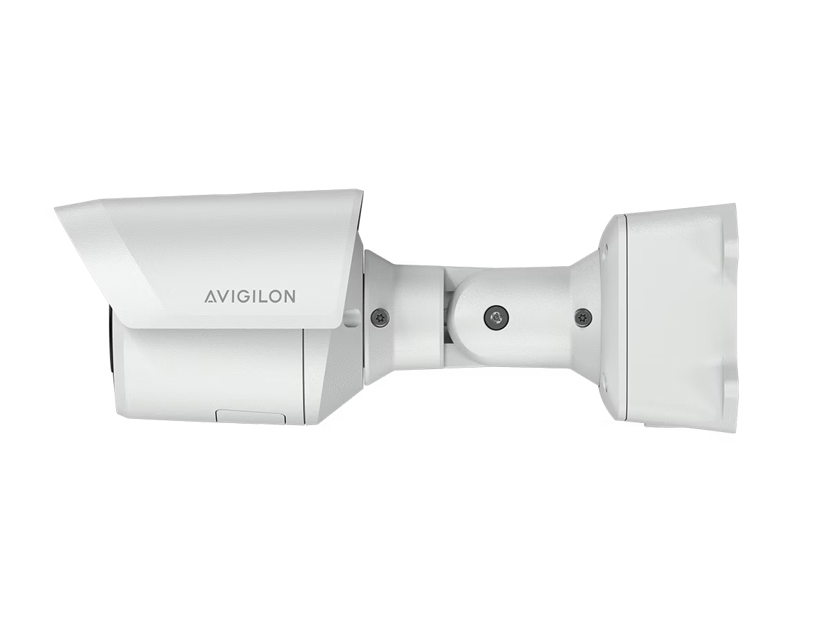 White surveillance camera on an adjustable mount.