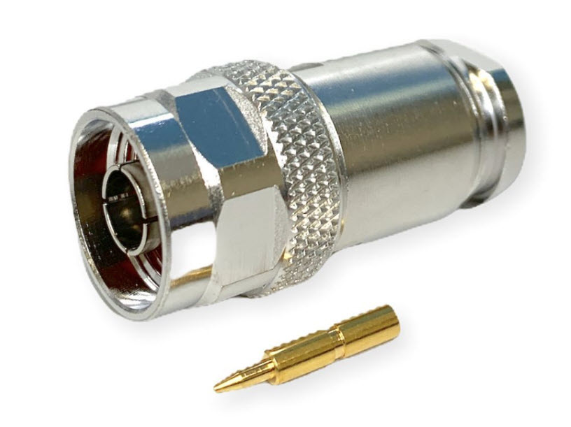 Metal connector with separate gold contact pin