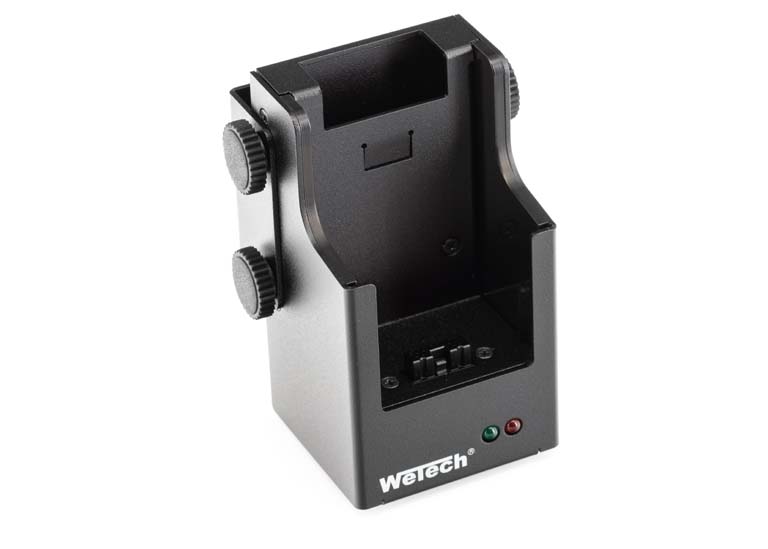 Black holder with logo and two knobs on the side.