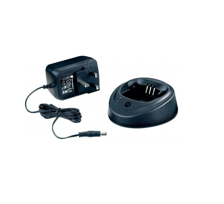 Black power adapter with cord next to a black charging dock.