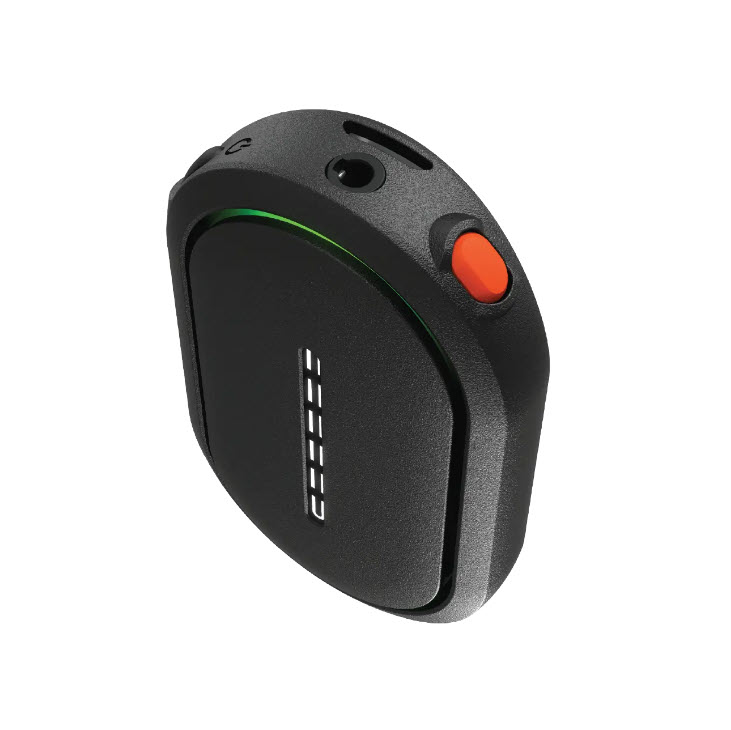 Black device with button and socket, glowing display.