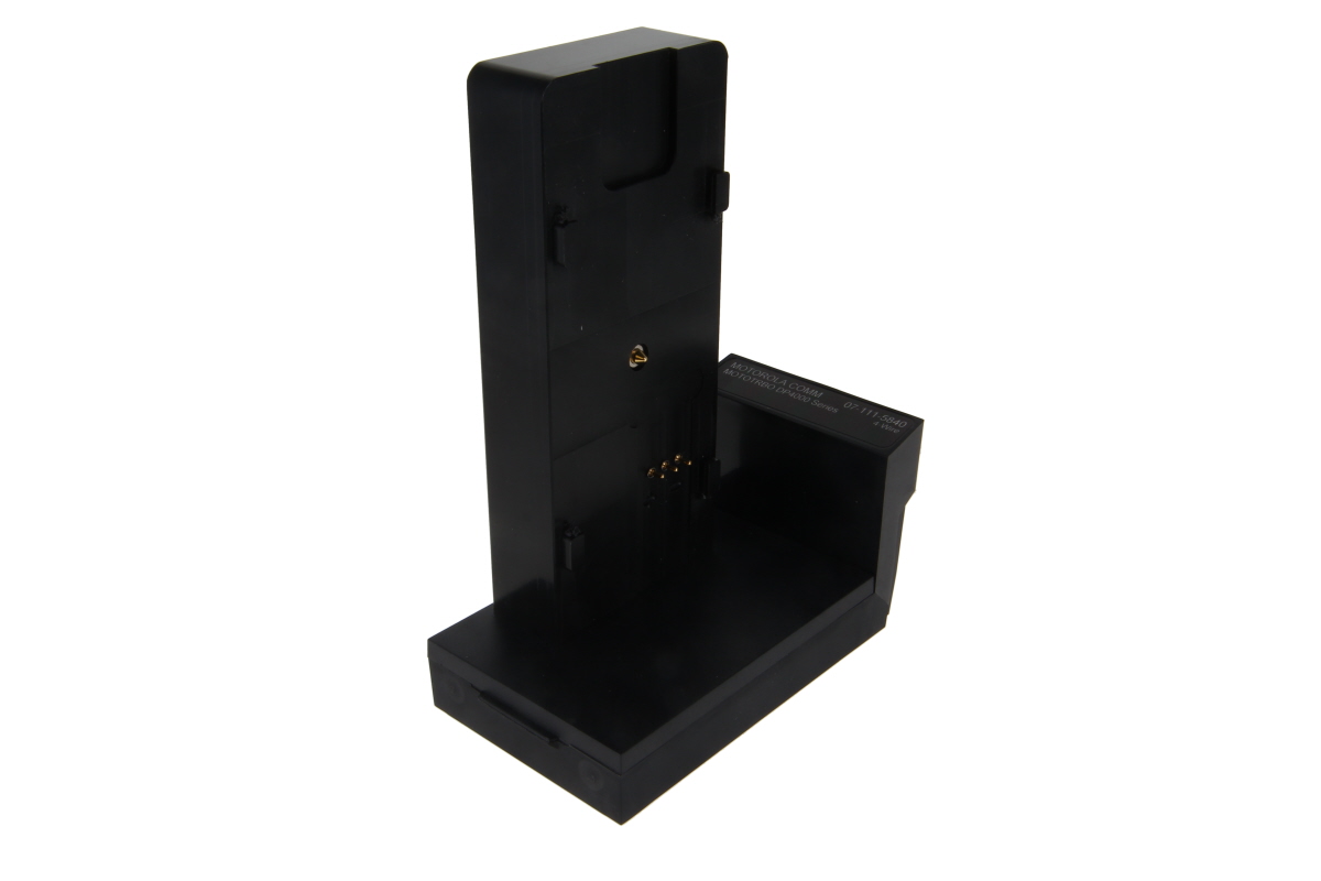 7000_00753348_COP_01.jpg Black charging dock for an electronic device with connectors.