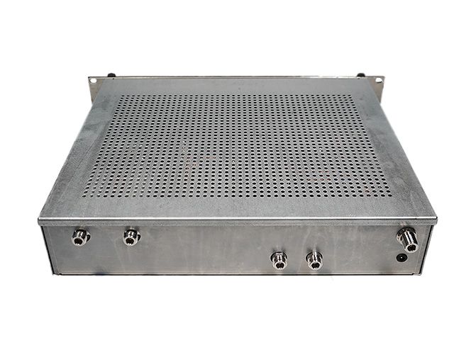 Metal casing with ventilation holes and multiple ports on the front.