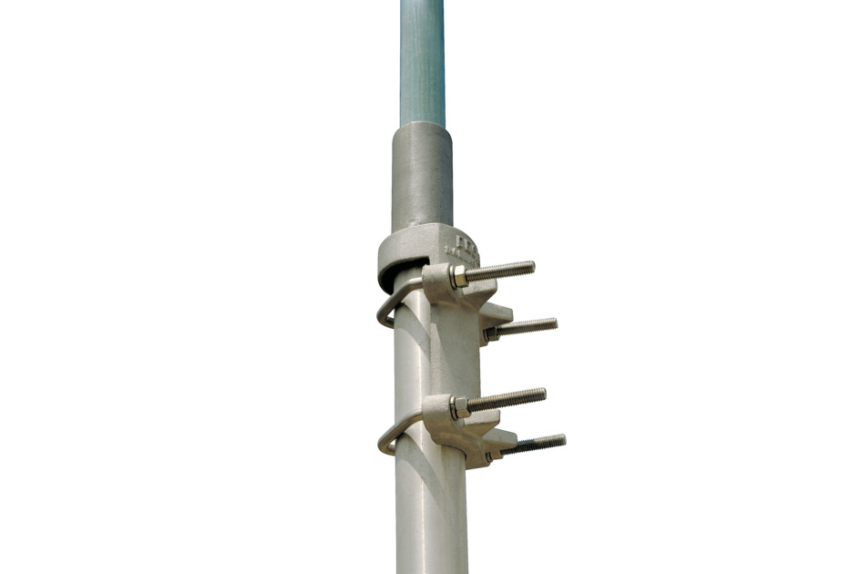 Metal pipe with bolts and clamps, part of a mounting.
