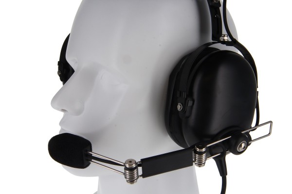 Headset with microphone on a white mannequin head.